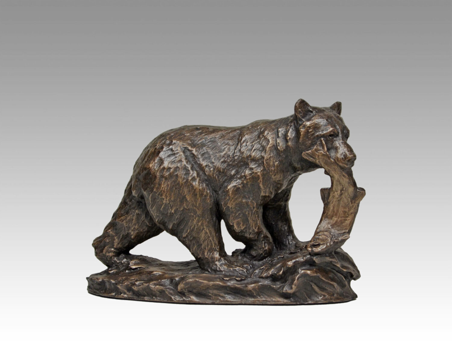Gallery, Shore Lunch, $275 CAD, Metal Infused, 10” L, Edition 60, Wildlife Sculpture of a bear and salmon, Sculptor Tyler Fauvelle