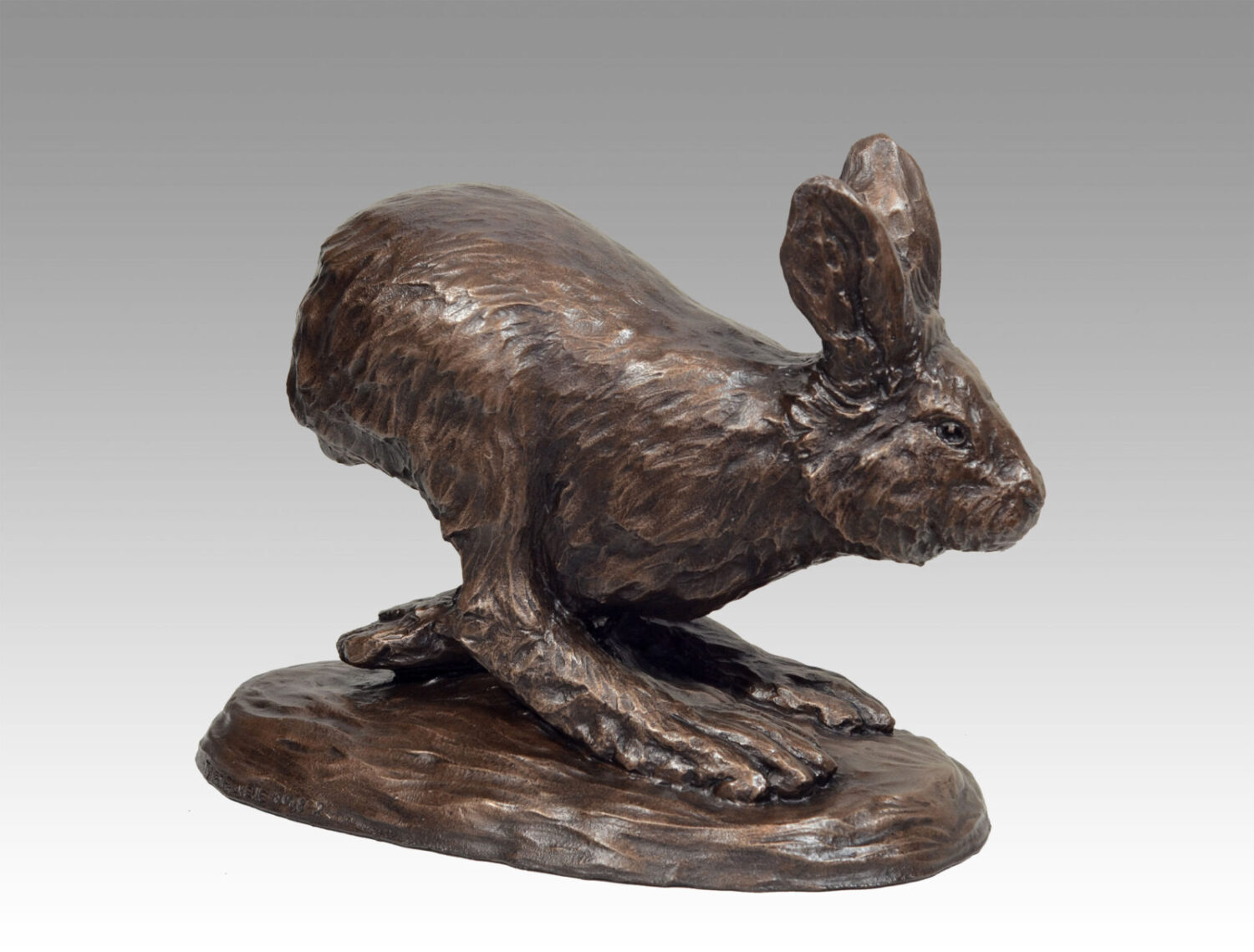 Gallery, Snowshoe Dash, $500 CAD, Metal Infused (Interior/Exterior), 16” L x 12” H, Edition 60, Wildlife Sculpture of a snowshoe hare, Sculptor Tyler Fauvelle