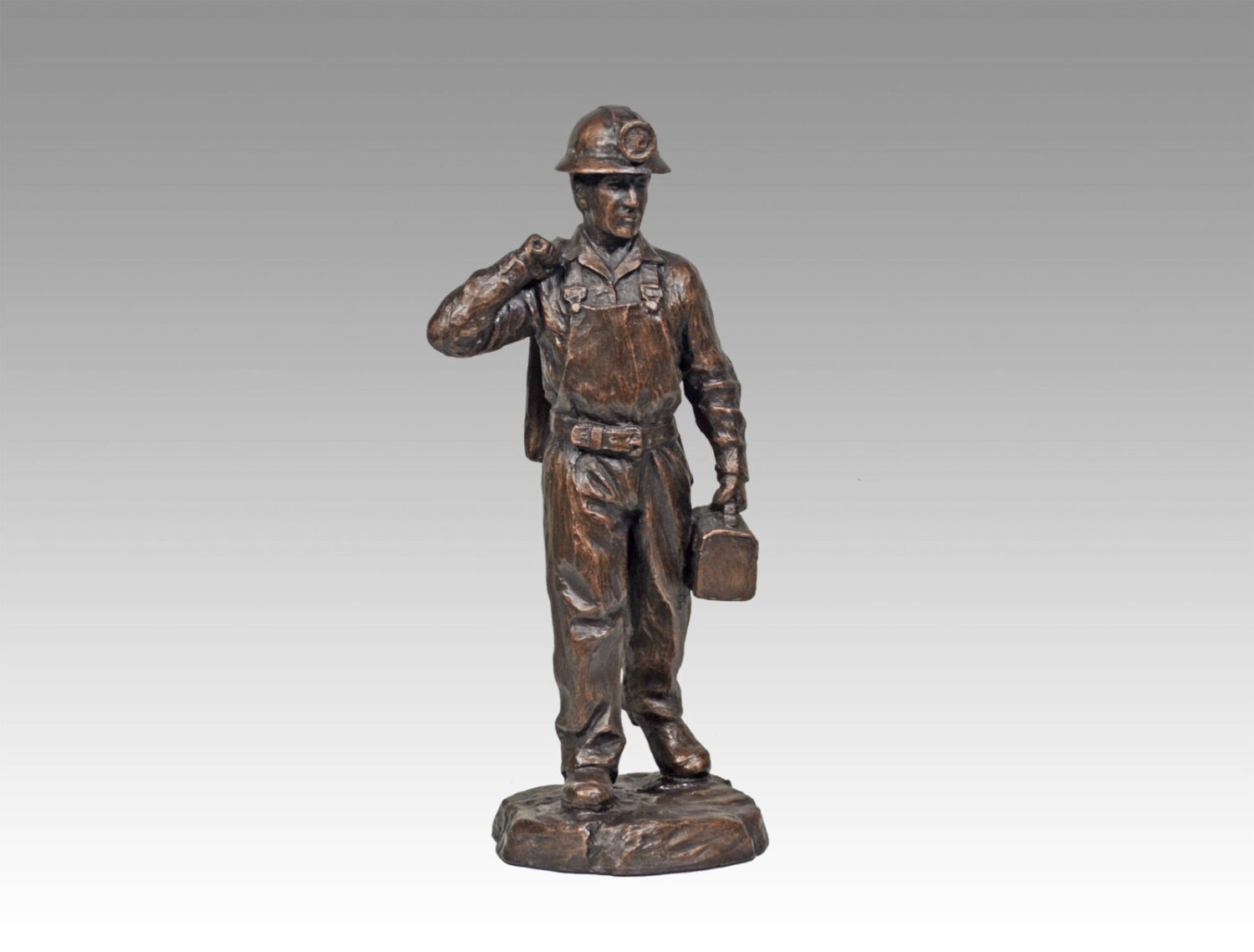 Gallery, Hardrock Worker, $250 CAD, Metal Infused, 14" H, Edition 80, Mining Sculpture of a miner coming off shift, Sculptor Tyler Fauvelle