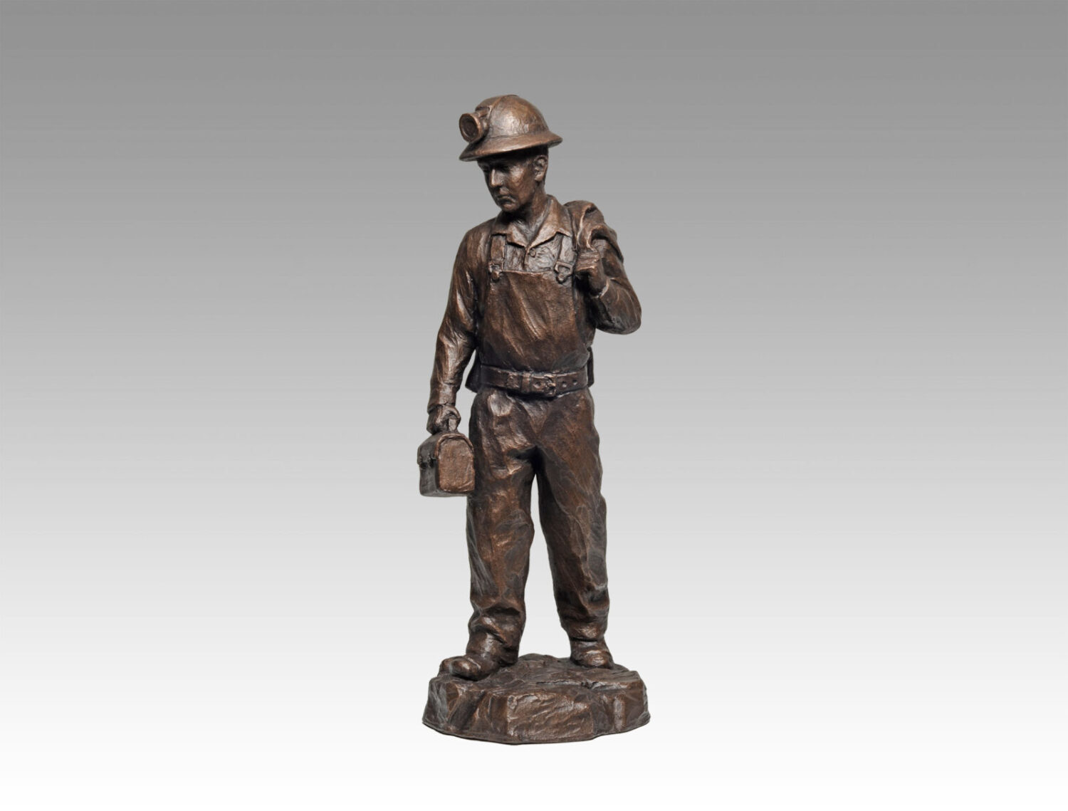 Gallery, Hardrock Man, $250 CAD, Metal Infused, 14” H, Edition 80, Mining Sculpture of a Male miner coming off shift, Sculptor Tyler Fauvelle