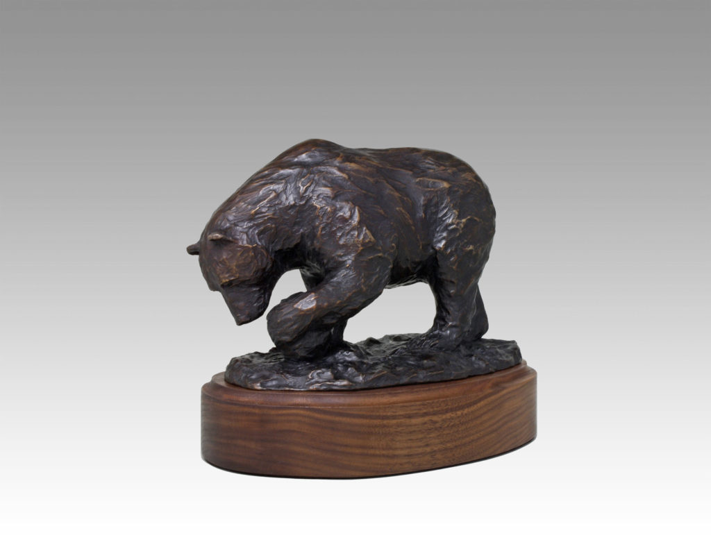 Gallery, Searching the Riverbank, Bronze cast, 8 ¾" L x 7 ½ " H mounted, Edition 15, Please contact for price and availability, Bronze Sculpture of a bear searching the riverbank, Sculptor Tyler Fauvelle