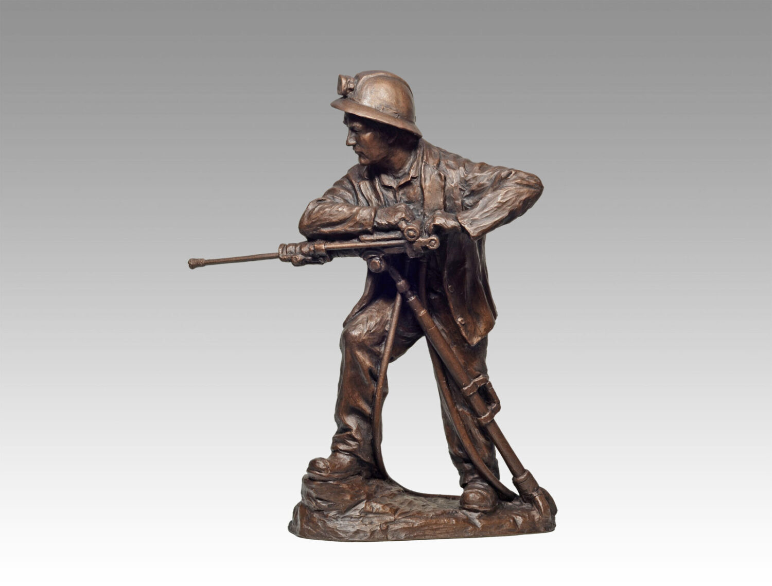 Gallery, Rockin the Drill (Jackleg Driller), $350 CAD, Metal Infused, 17” H x 13 ½” L, Edition 80, Mining Sculpture of a Jackleg Driller , Sculptor Tyler Fauvelle