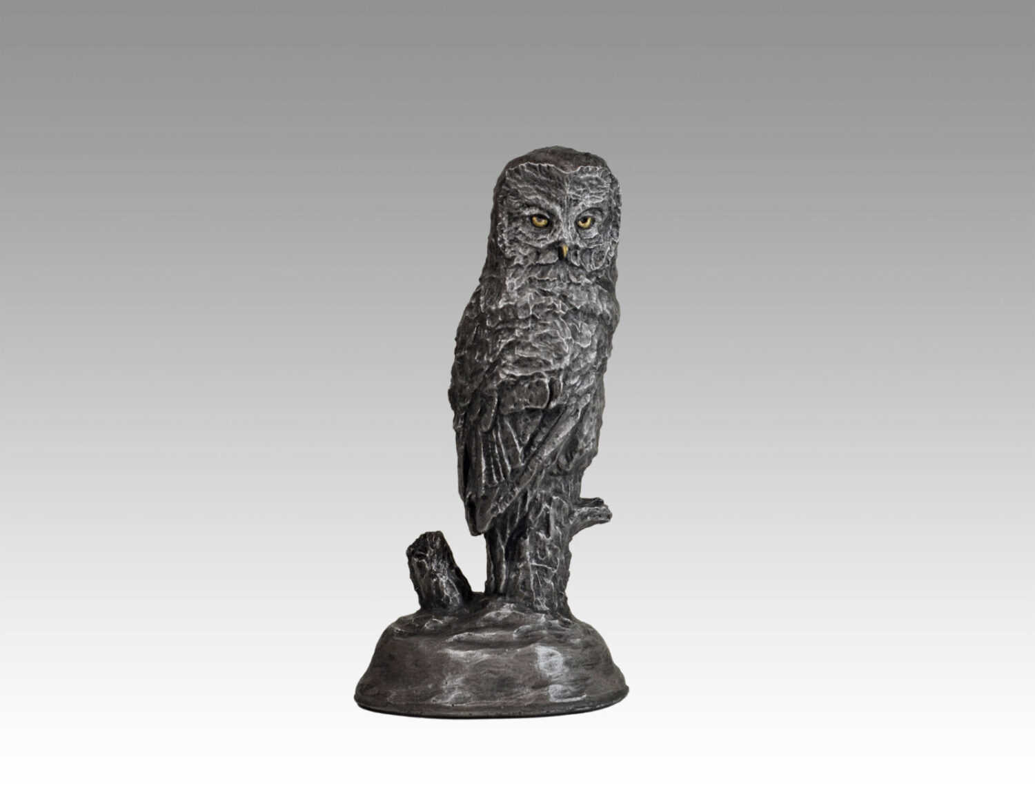 Gallery, Grey Ghost, $275 CAD, Metal Infused, 11” H, Edition 60, Moonlit Ore Finish, Wildlife Sculpture of a grey owl, Sculptor Tyler Fauvelle