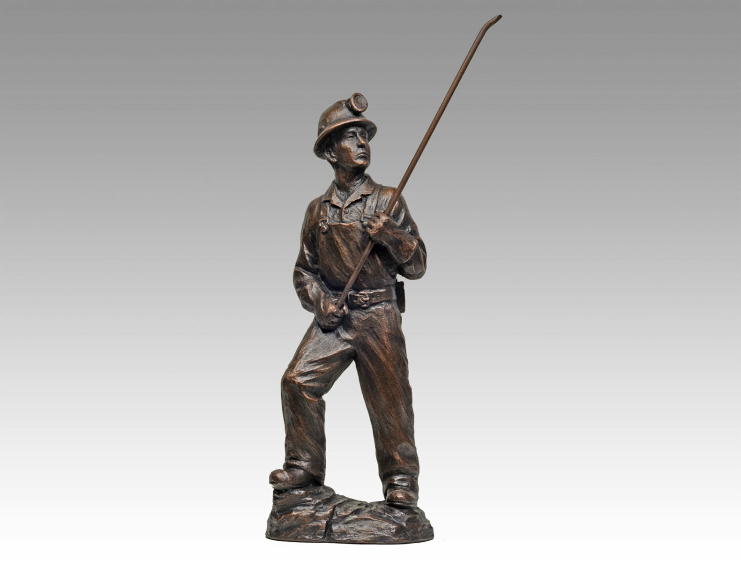 Gallery, Scaling Away, $260 CAD, Metal Infused, 16 ½” H with scaling bar, Edition 80, Mining Sculpture of a Miner with Scaling bar, Sculptor Tyler Fauvelle