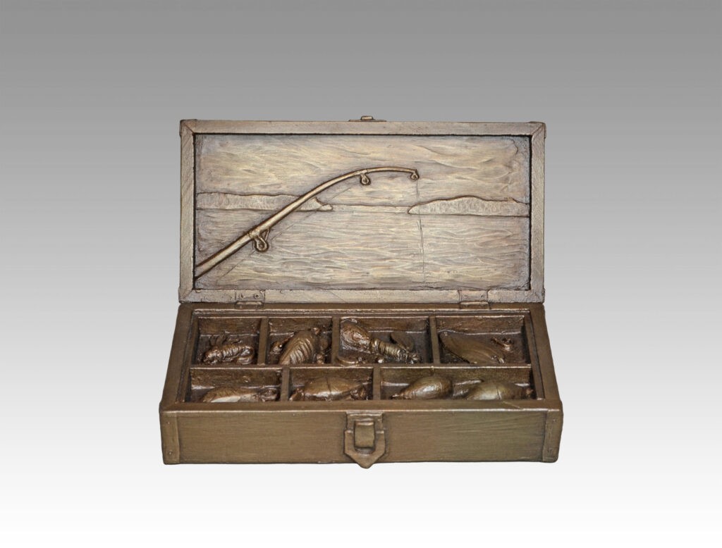 Gallery, The Angler (Tackle Box), $325 CAD, Metal Infused, 10" L x 6" H, Edition 30, Sculpture of a Tackle Box with sculpted lures, flies, bobbers, hooks and sinkers, Sculptor Tyler Fauvelle